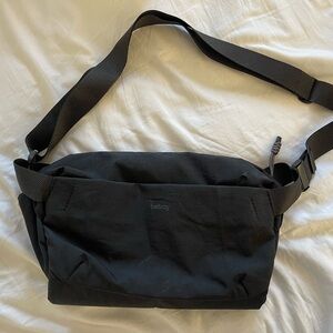 Bellroy Venture Sling 9L in midnight black. Faint stain inside the bag,